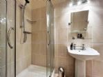 En suite to master bedroom with both bath and shower