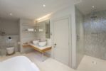 Master bedroom ensuite with bath and large walk in shower