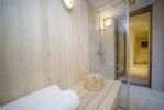 Sauna with shower leading to the bedroom 2