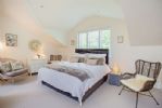 Wonderful roomy bedroom with seating